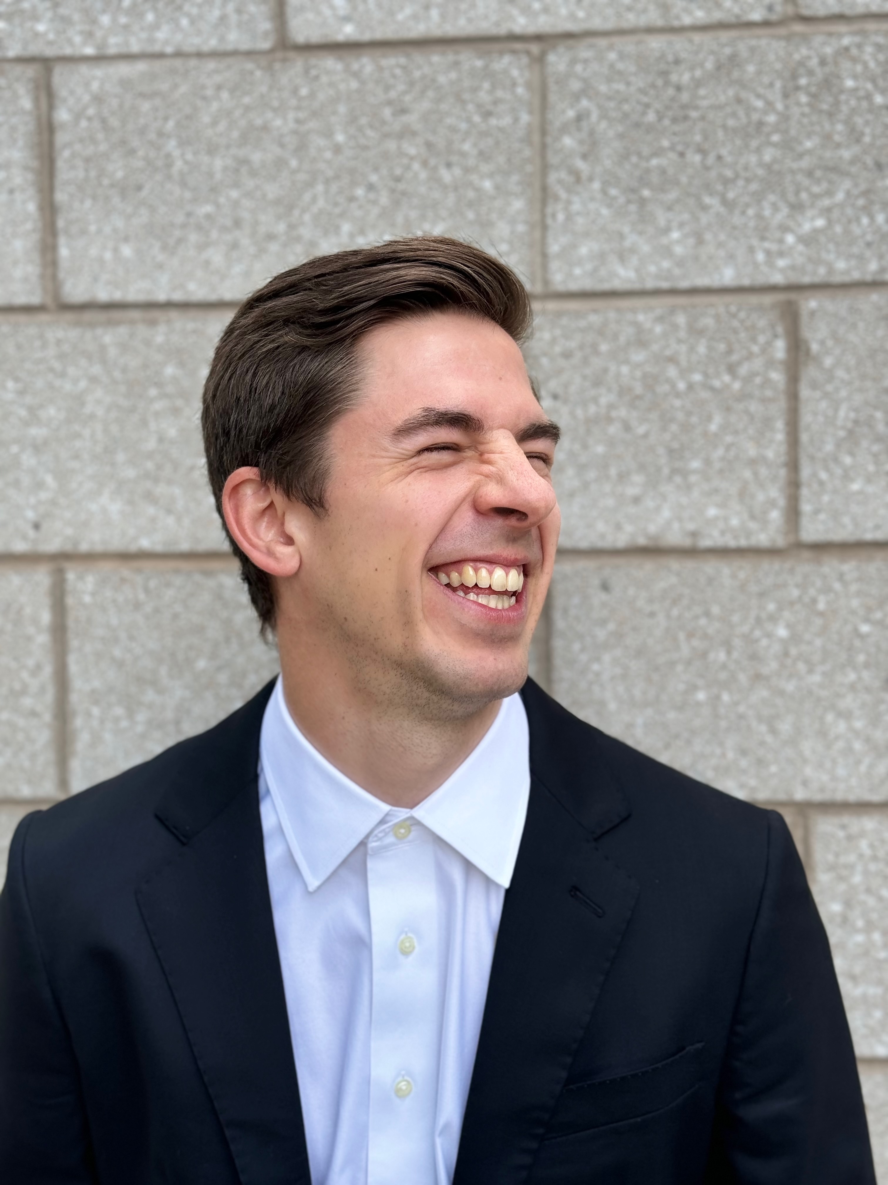 Jacob Stephens smiling outdoors.