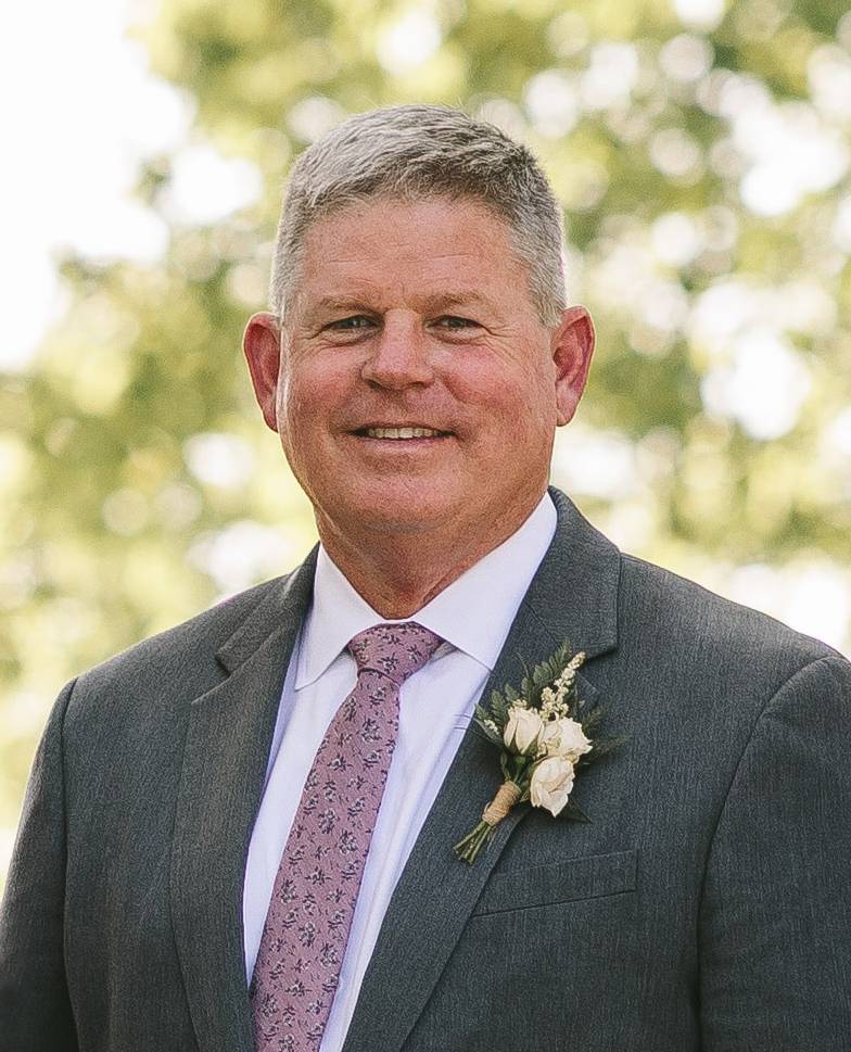 Jeff Hallowell headshot with corsage